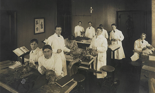 black and white photo of anatomists in lab
